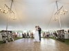 Bride and groom's first dance at a rustic outdoor wedding in Colorado.